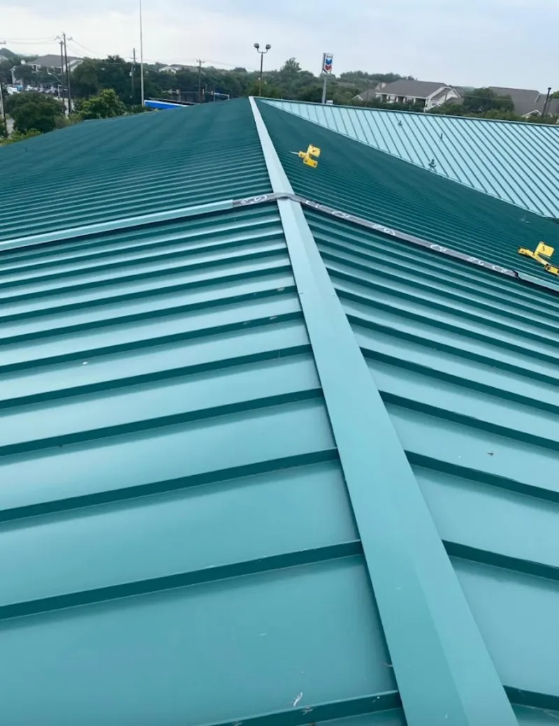Green commercial metal roof ridge and valley for Metal Roof Repair in Gilberts