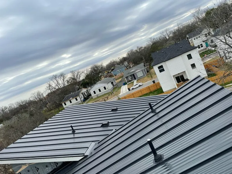 Standing seam metal roof panels with vents for Skylight Repair in Gilberts